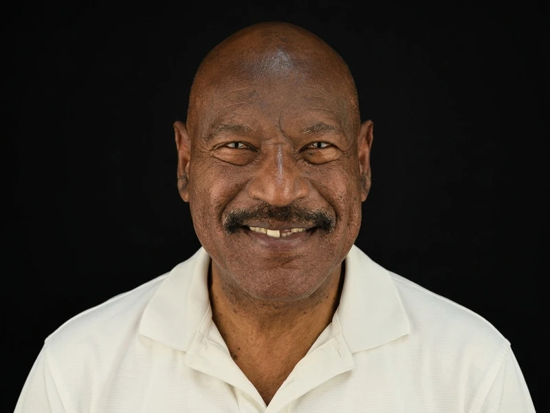 Charles before his smile makeover at Let’s Smile Dentistry, with a missing front tooth